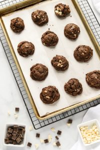 Decadent triple chocolate cookies. These cookies are soft and chewy with loads of gooey chocolate.