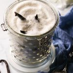 A glass jar filled with homemade vanilla sugar.