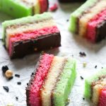 Rainbow cookies with raspberry and apricot jam