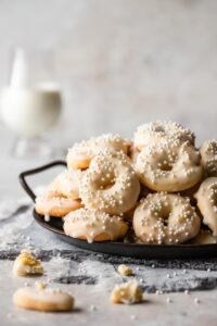 Ciambelle, Italian lemon ring-shaped cookies with lemon glaze and sprinkles.