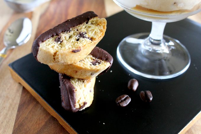 Chocolate anise biscotti served on a black tray.