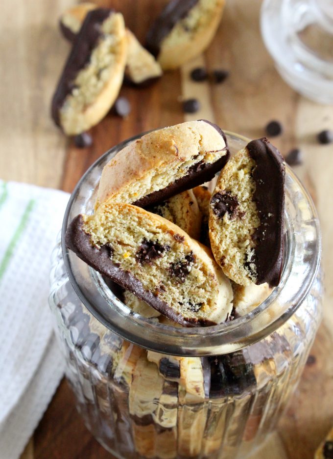 A glass jar full of anise flavoured biscotti