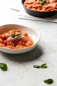 Potato gnocchi with tomato basil sauce.