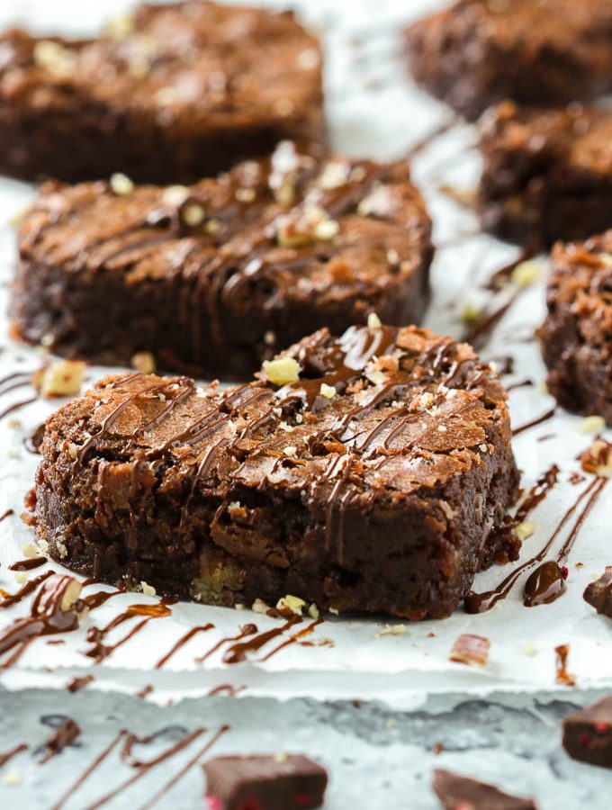 Chocolate and raspberry brownies with pecans.