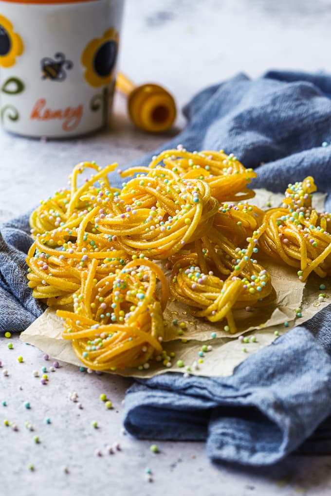 Crispy capellini pasta shaped into a birds nest, deep fried and soaked in orange honey.