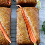 Baked carrot loaves topped with a carrot