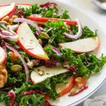 Thin slices of apples, radicchio and kale salad tossed with apple cider vinaigrette.