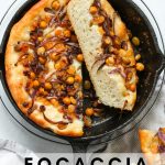 Focaccia bread baked in a cast iron skillet.