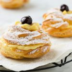 Oven baked Zeppole filled with custard.