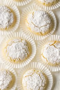 Ricciarelli cookies on white candy wrappers.