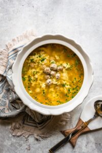 Stracciatella soup with Mini Meatballs.