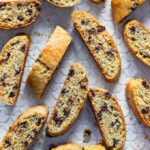 Baked and sliced biscotti with chocolate chips.